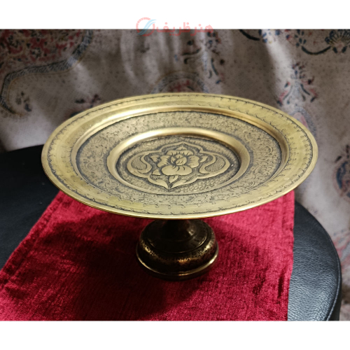 تصویر شیرینی‌ خوری برنجی سنتی با طرح اسلیمی دست‌ ساز صنایع دستی هنرظریف